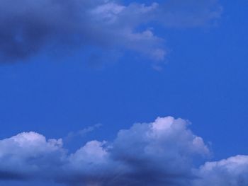 Low angle view of clouds in blue sky