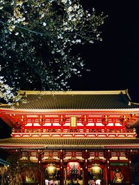 Low angle view of illuminated building at night