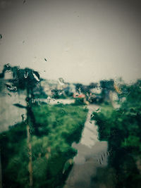 Water drops on glass window of rainy season