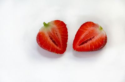 Close-up of fruits against white background