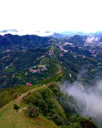 Scenic view of tree mountains against sky