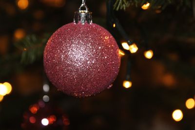 Close-up of illuminated christmas tree at night