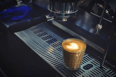 High angle view of coffee cup on table