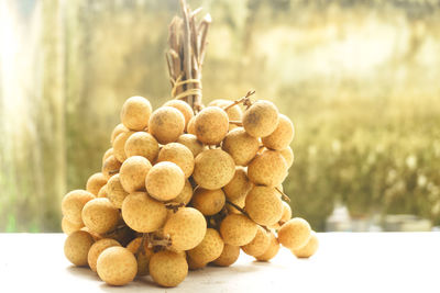 Close-up of longan on table