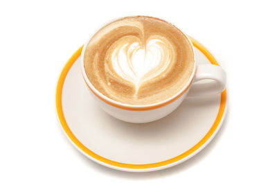 Close-up of coffee cup over white background