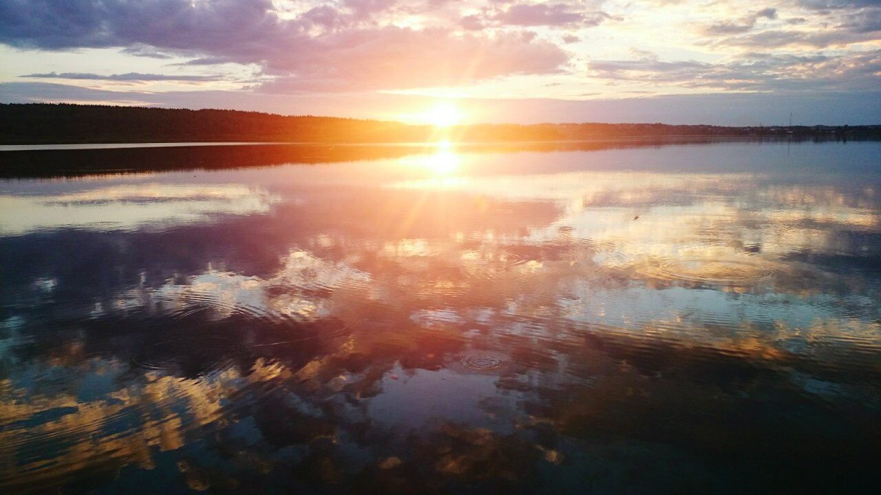 reflection, sunset, nature, water, tranquility, tranquil scene, scenics, beauty in nature, lake, sky, outdoors, no people, sun, cloud - sky, idyllic, sunlight, waterfront, landscape, day