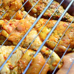 High angle view of meat on barbecue grill