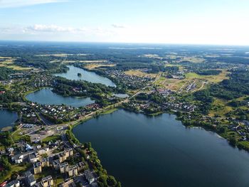 High angle view of river amidst buildings against sky