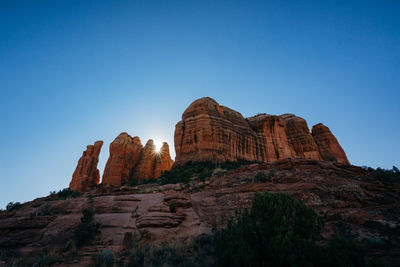 View of rock formation against clear sky