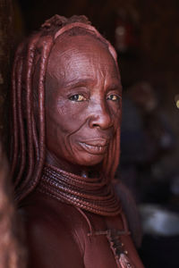 Portrait of an old himba traditional woman, oncocua, angola