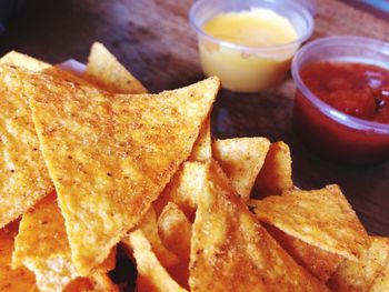 Close-up of tortilla chips served on table