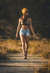 Full length of woman walking on land