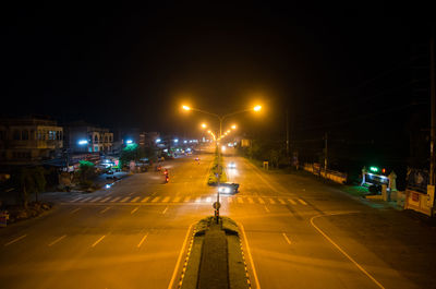 Cars on road at night
