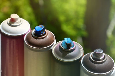 Close-up of aerosol cans 