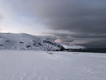 Scenic view of snowcapped mountain against sky