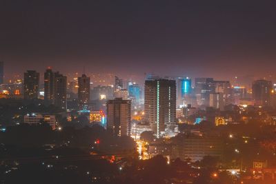 Illuminated cityscape at night