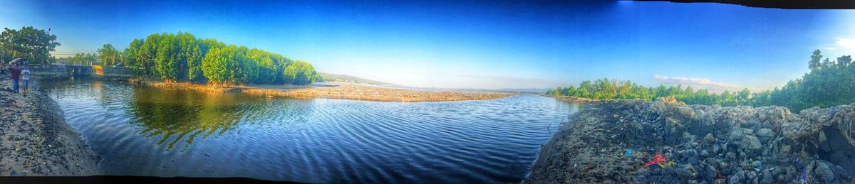 Scenic view of calm sea against sky