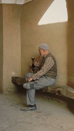 Man sitting on wall