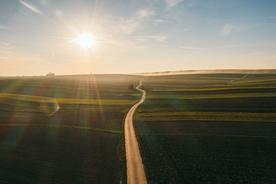 Scenic view of landscape against sky during sunset