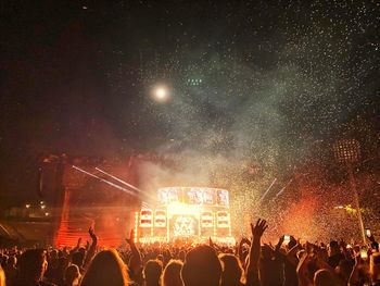 Crowd at music concert at night
