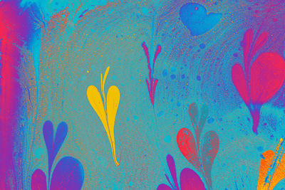 Close-up of multi colored graffiti on wall
