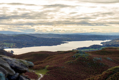 Scenic view of landscape and mountains against sky