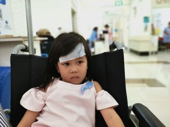 Portrait of a girl sitting in bus