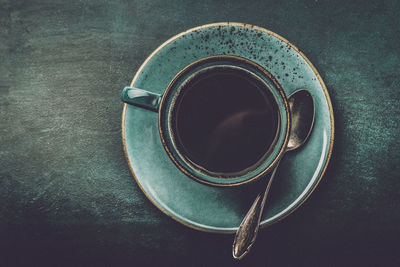 High angle view of coffee cup on table