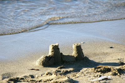 A sandy castle by the sea
