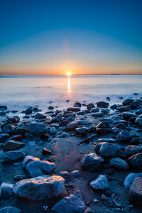 Scenic view of sea during sunset