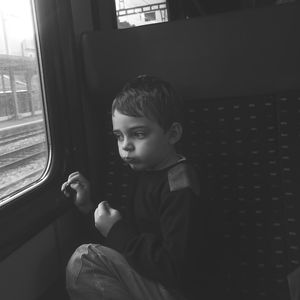 Boy traveling in train