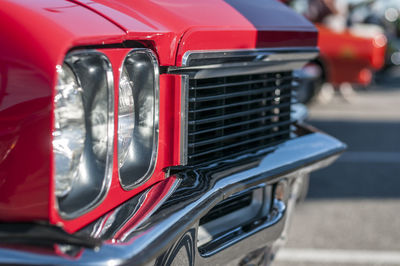 Close-up of vintage car on street