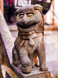 Close-up of buddha statue in temple