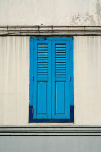 Blue closed door of building