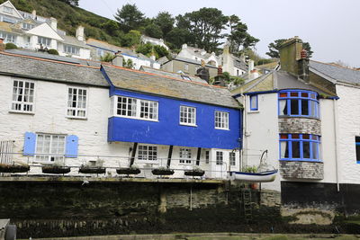 Residential buildings against blue sky
