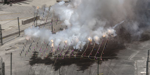 High angle view of smoke emitting from chimney