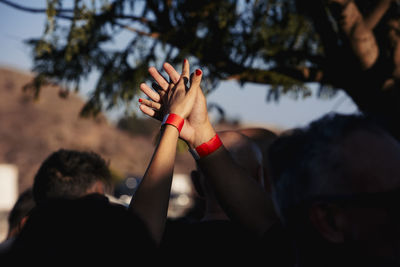 Cropped hand of woman holding hands
