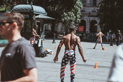 People on street in city