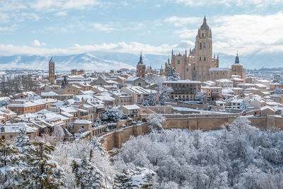 View of buildings in city during winter