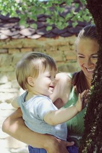 Mother and daughter outdoors