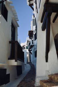 Alley amidst buildings in town