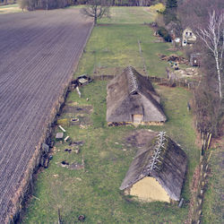 Historical houses with traditional reed grass roofs, aerial photo taken at an angle