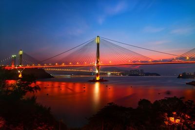 View of suspension bridge at night