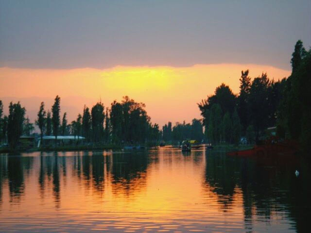 sunset, water, waterfront, reflection, tranquil scene, tranquility, scenics, tree, beauty in nature, sky, lake, orange color, silhouette, nature, idyllic, calm, dusk, outdoors, no people, river