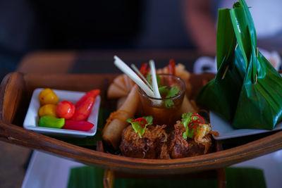 Close-up of serving food in plate on table
