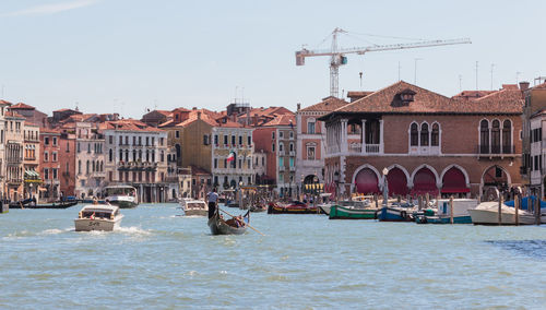 Boats on canal in venice