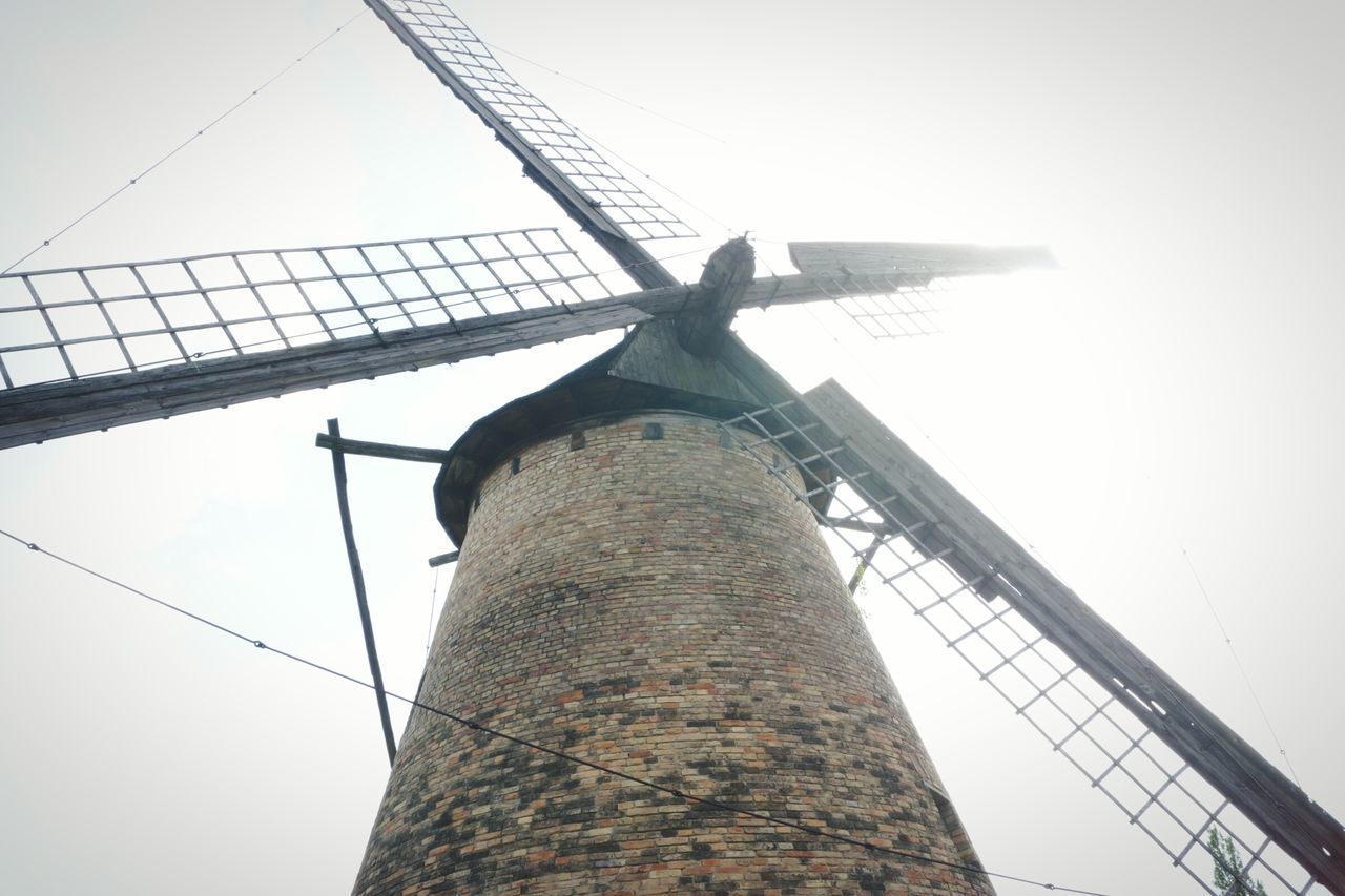 LOW ANGLE VIEW OF WINDMILL AGAINST CLEAR SKY