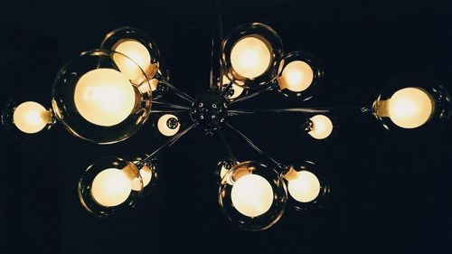 Low angle view of illuminated light bulb