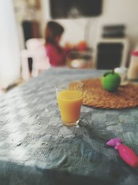 Close-up of drink on table at home