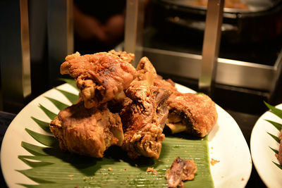 Close-up of meat in plate on table